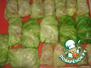 Голубцы, запечeнные под сметанно-луковым соусом