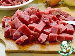 Говядина в луковом соусе