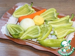 Половинки перца, запечённые с начинкой Половинки перца, запечённые с начинкой