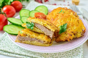 Свиные отбивные в картофельном кляре на сковороде Свиные отбивные в картофельном кляре на сковороде