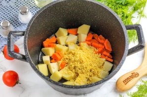 Уха из брюшек семги с пшеном Уха из брюшек семги с пшеном