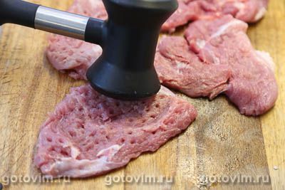 Свинина под шубой из сыра и вареного яйца Свинина под шубой из сыра и вареного яйца