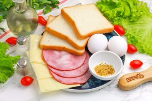 Тосты с ветчиной и сыром Тосты с ветчиной и сыром