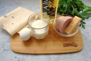 Треугольники из лаваша с начинкой из сыра и колбасы Треугольники из лаваша с начинкой из сыра и колбасы